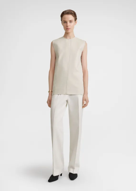 Sleeveless twisted-seam top pebble sold by Toteme