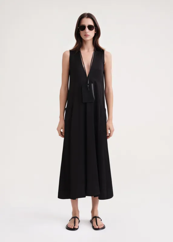 Deep V-neck patch pocket dress black sold by Toteme