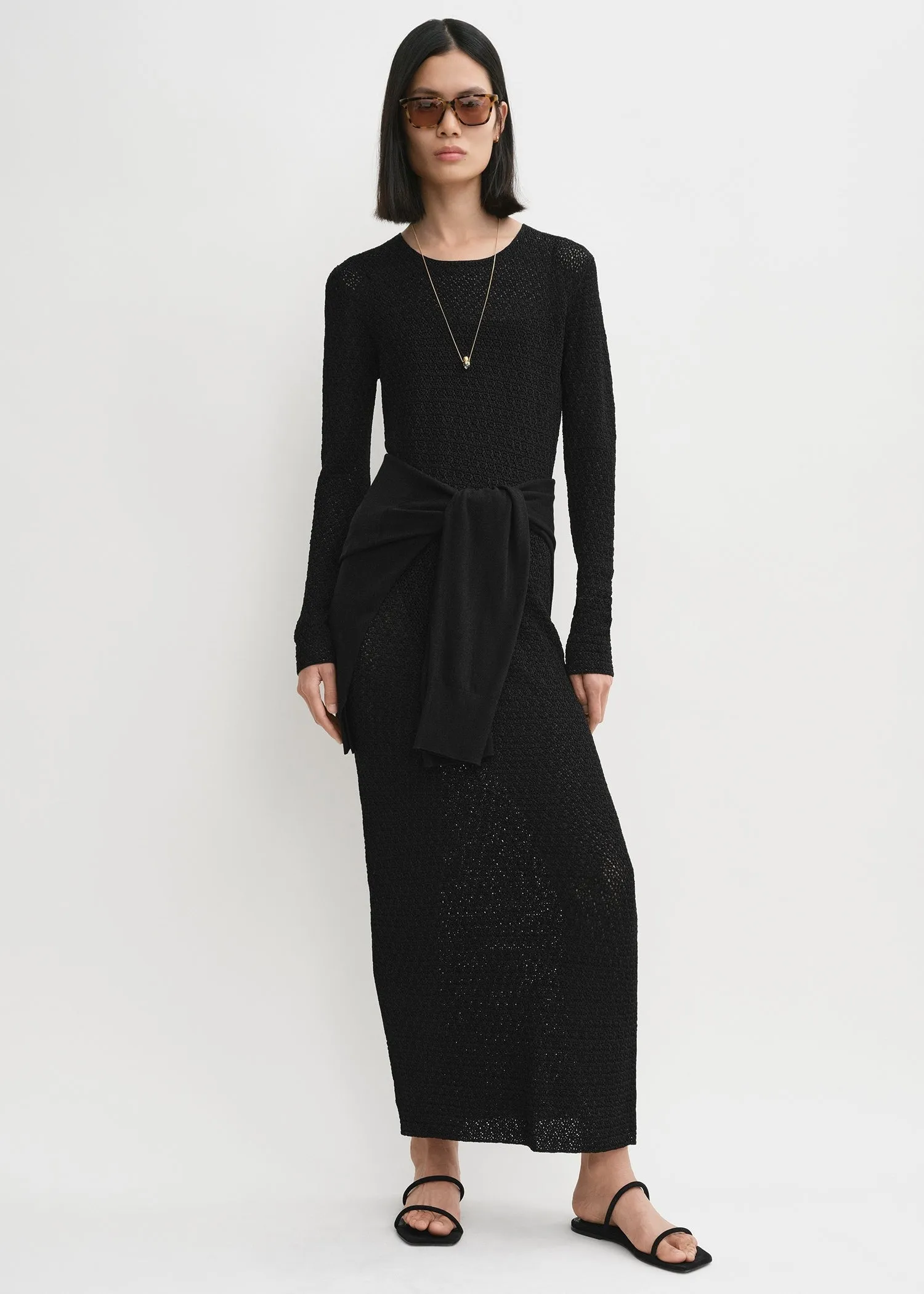 Long-sleeve crochet dress black sold by Toteme