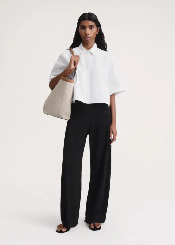 Monogram pointelle trousers black sold by Toteme