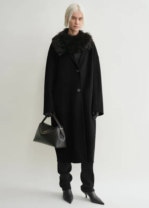 Doublé cocoon coat black sold by Toteme