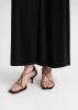 The Leather Knot Sandal black sold by Toteme