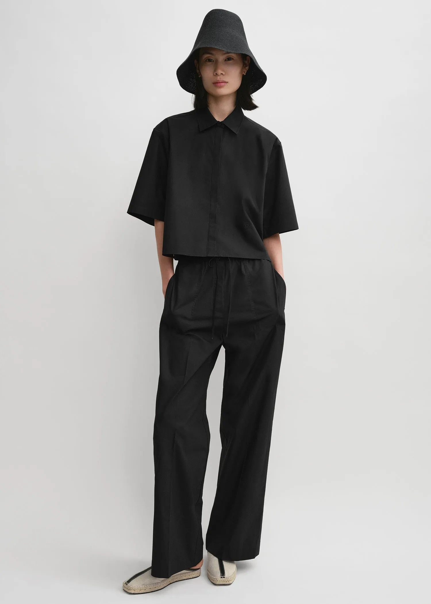 Cropped cotton-poplin shirt black sold by Toteme