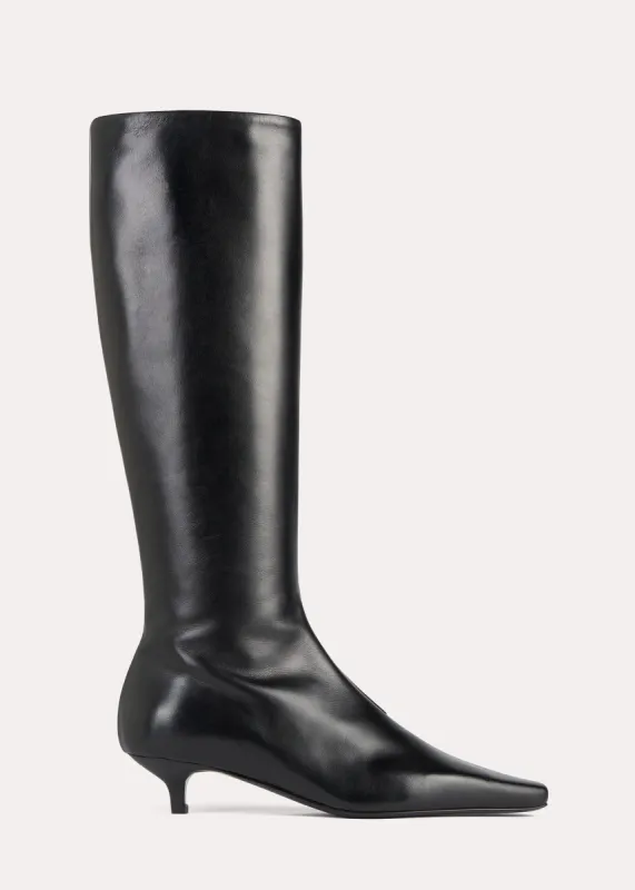 Slim leather-suede knee-high boots black sold by Toteme