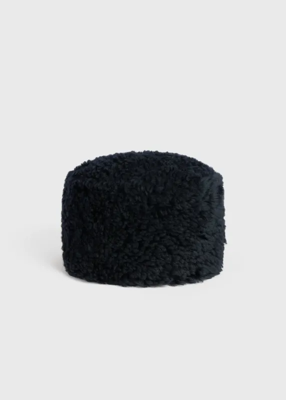 Shearling pillbox hat navy sold by Toteme