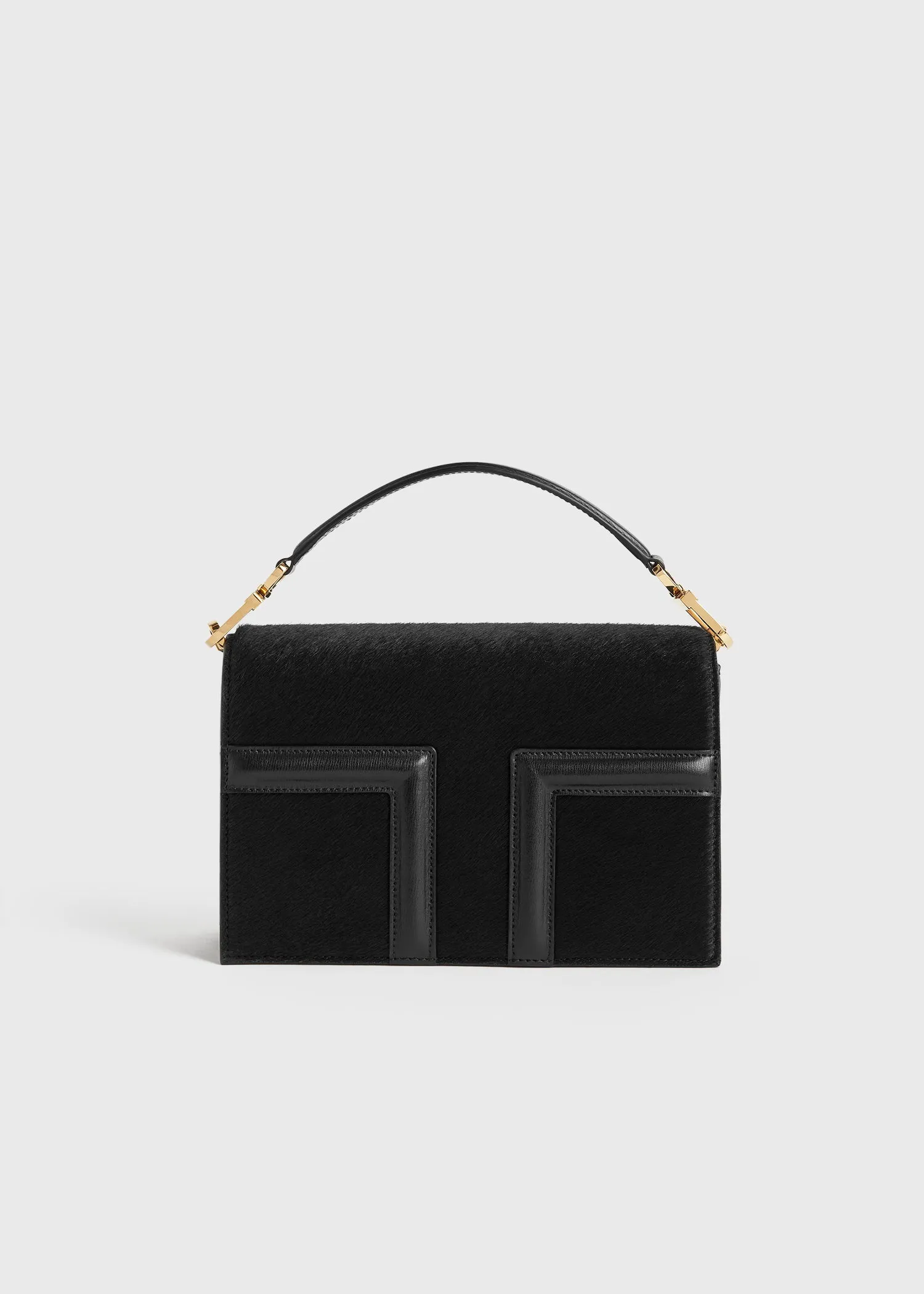 Mini T-Flap pony hair bag black sold by Toteme