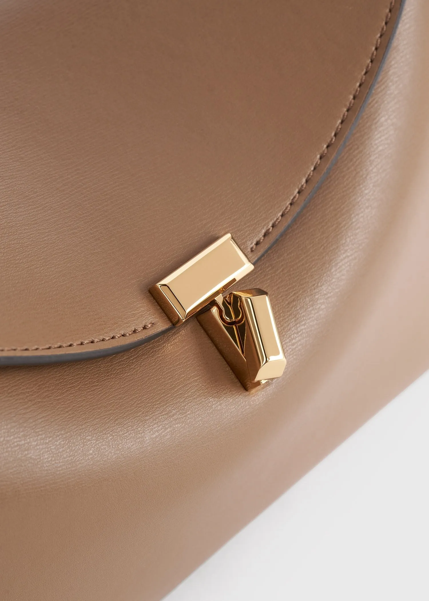 T-lock leather clutch camel sold by Toteme product image thumbnail 5