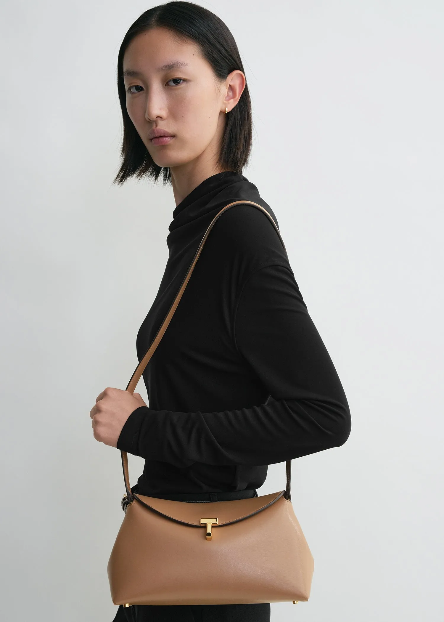 T-lock leather clutch camel sold by Toteme product image thumbnail 3