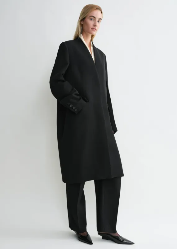 Deep pleat coat black sold by Toteme