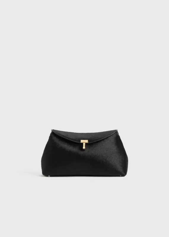 T-lock pony hair clutch black sold by Toteme