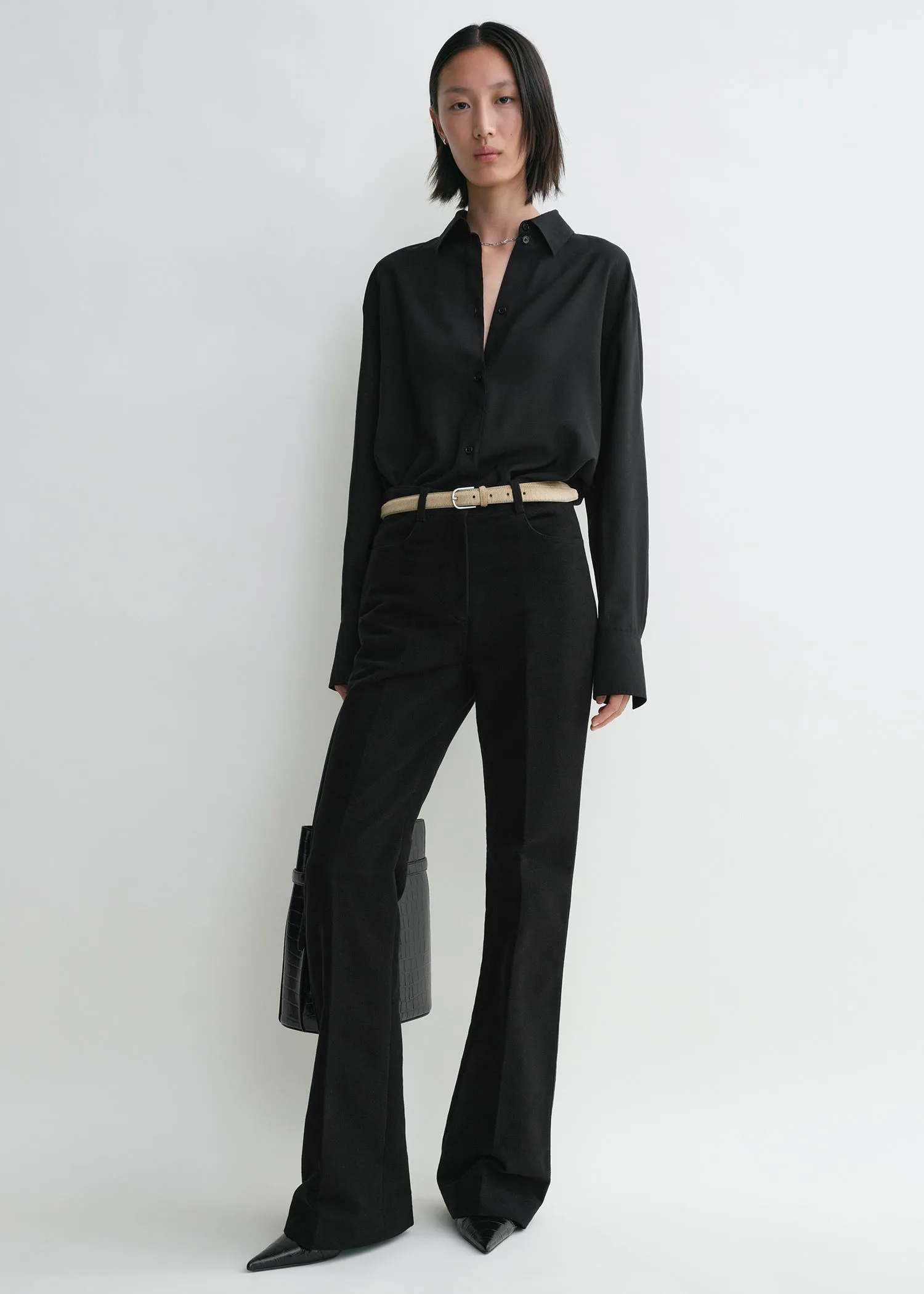 Flared moleskin trousers black sold by Toteme