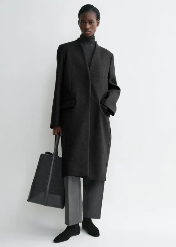 Deep pleat coat charcoal melange sold by Toteme