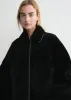 Teddy shearling overshirt jacket black sold by Toteme