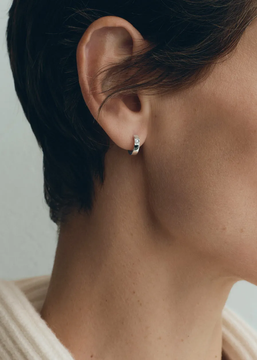 Bezel diamond hoops 18kt white gold sold by Toteme product image thumbnail 2