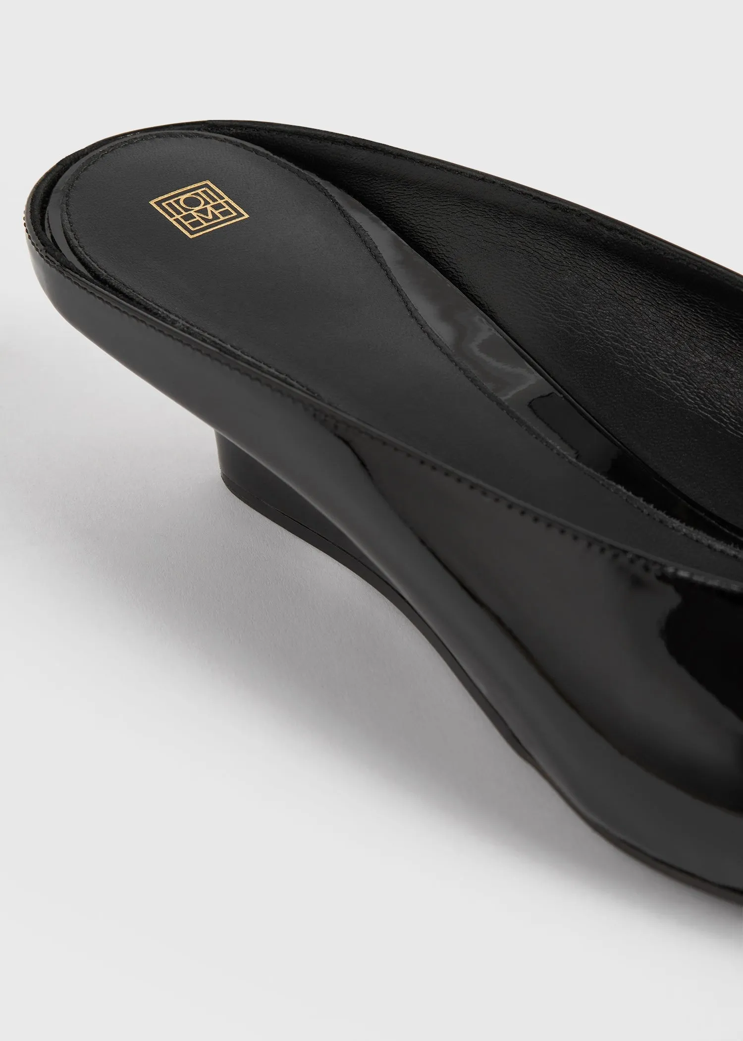 Sharp patent wedge mules black sold by Toteme product image thumbnail 5