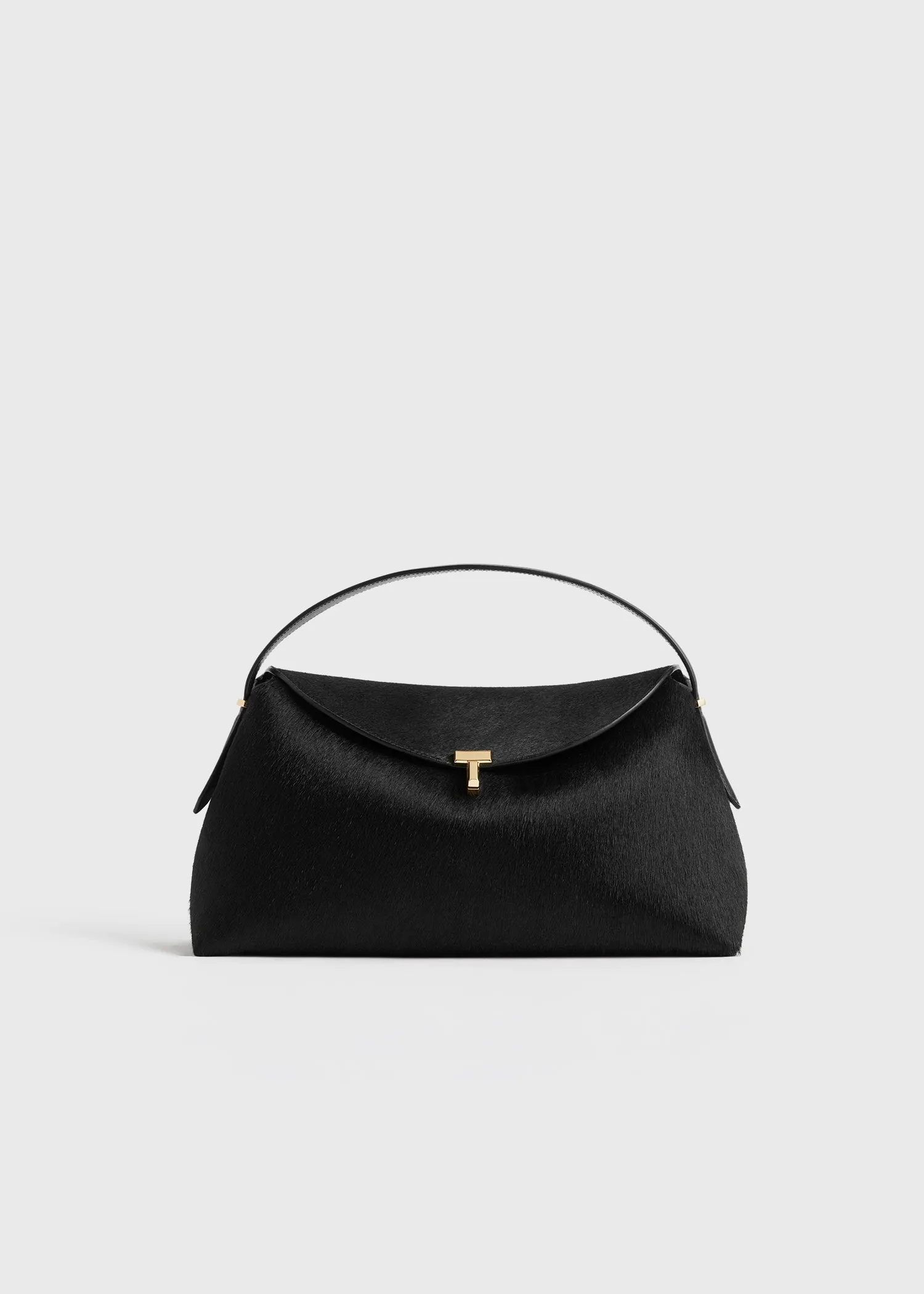 T-lock pony hair top handle black sold by Toteme