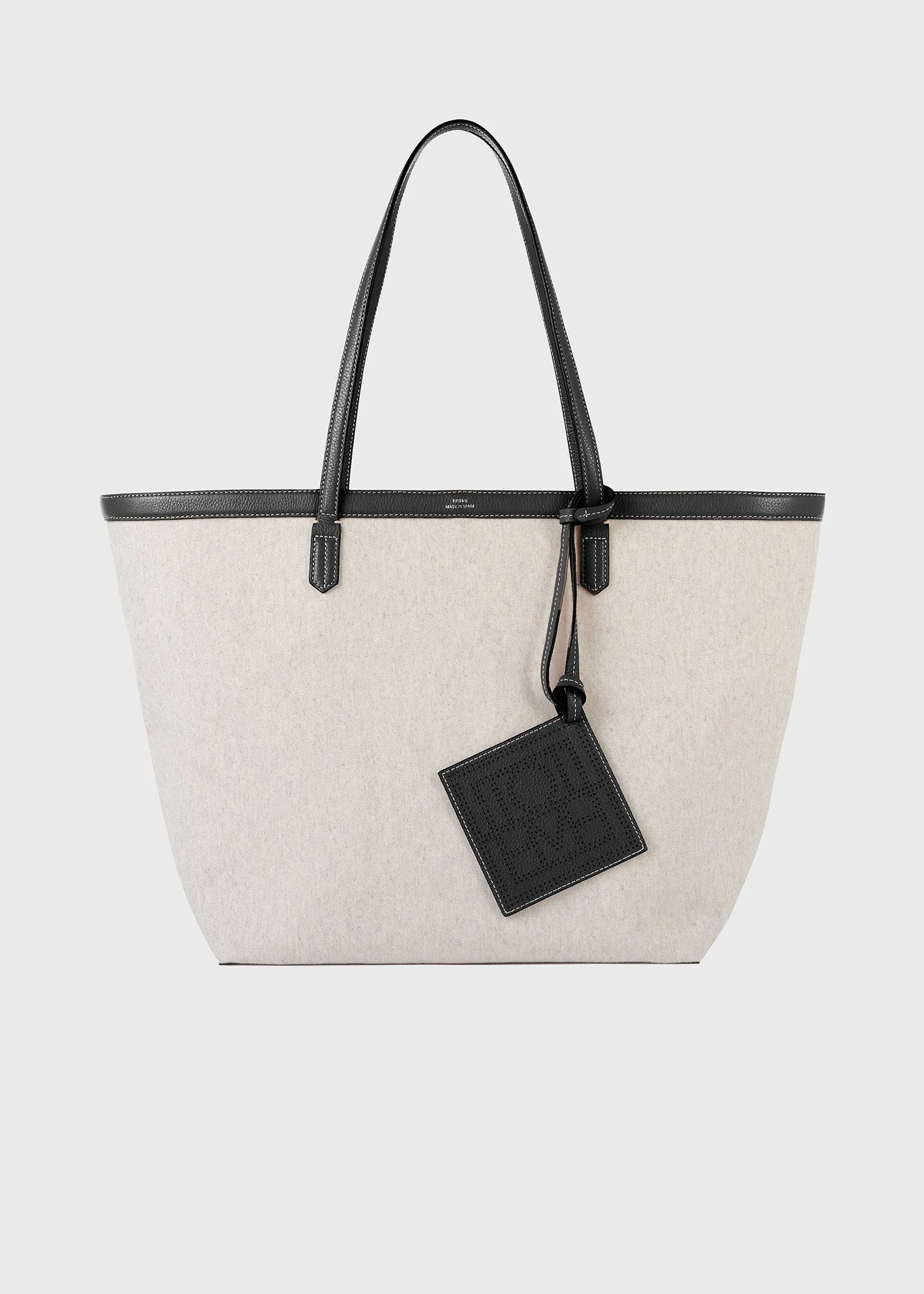 Canvas travel tote ecru/black sold by Toteme