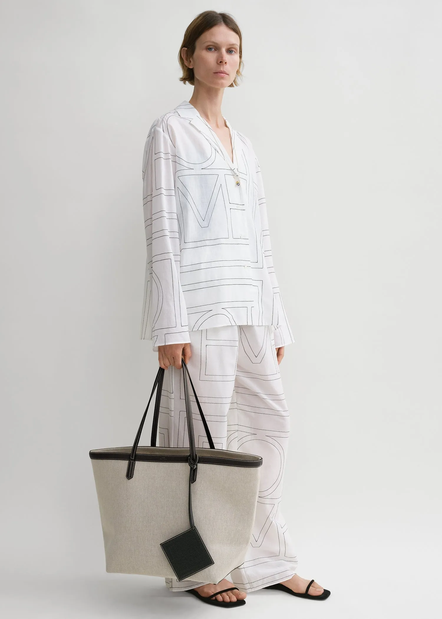 Canvas travel tote ecru/black sold by Toteme product image thumbnail 2