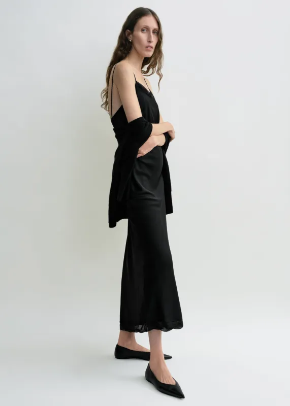 Satin slip dress black sold by Toteme