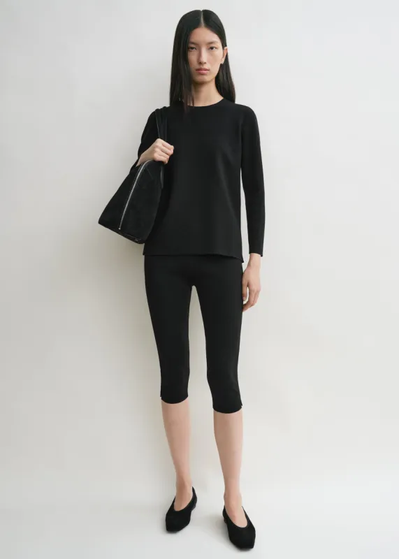 Compact knit capri trousers black sold by Toteme
