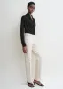 Low slim denim ecru sold by Toteme