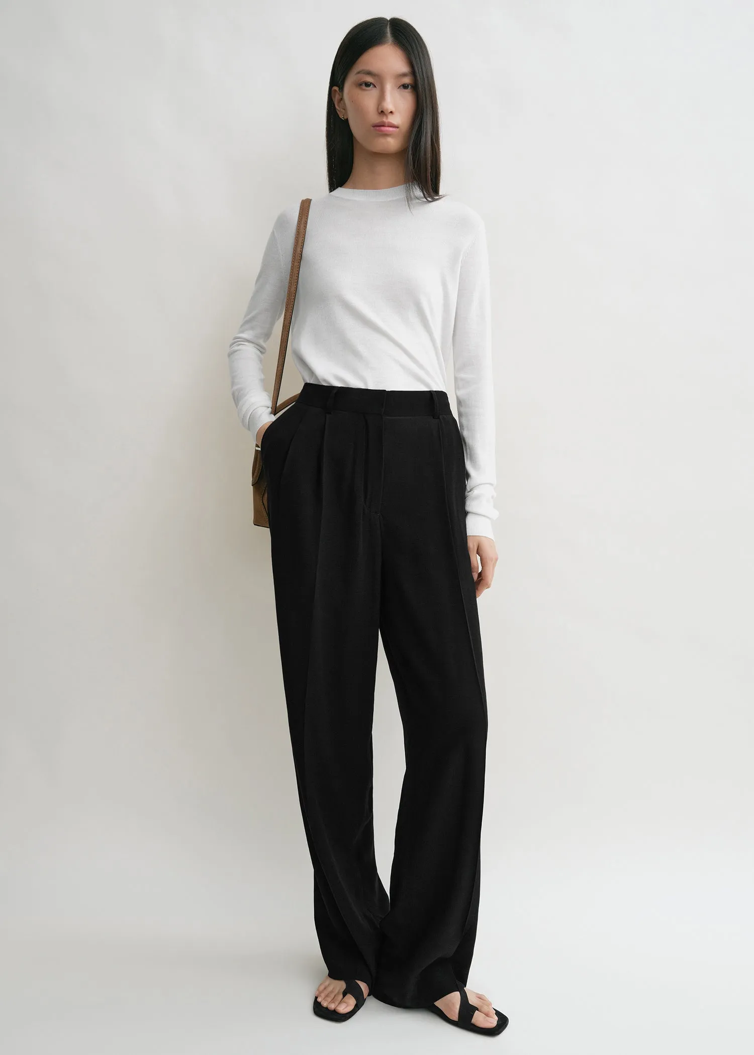 Double-pleat summer trousers black sold by Toteme