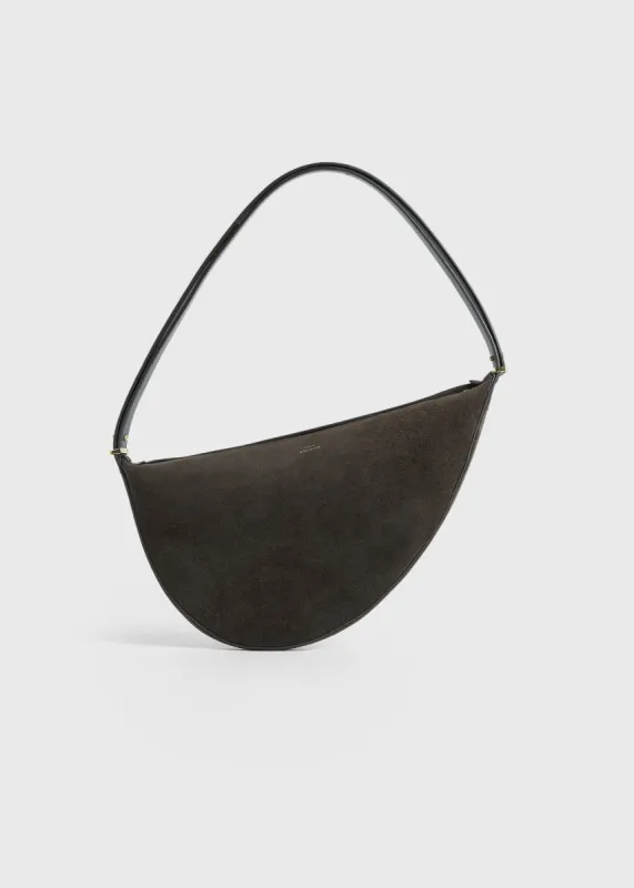 Suede scooped sling pepper sold by Toteme