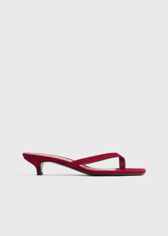 Suede heeled flip flops scarlet sold by Toteme
