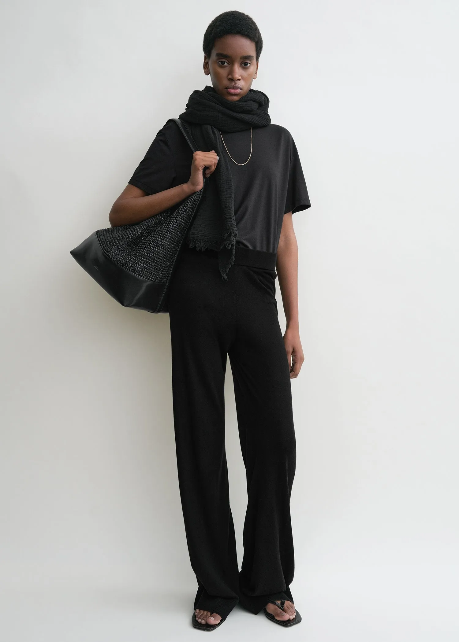 Wide knit trousers black sold by Toteme