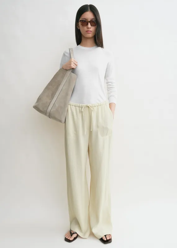 Woven stripe drawstring trousers ecru sold by Toteme