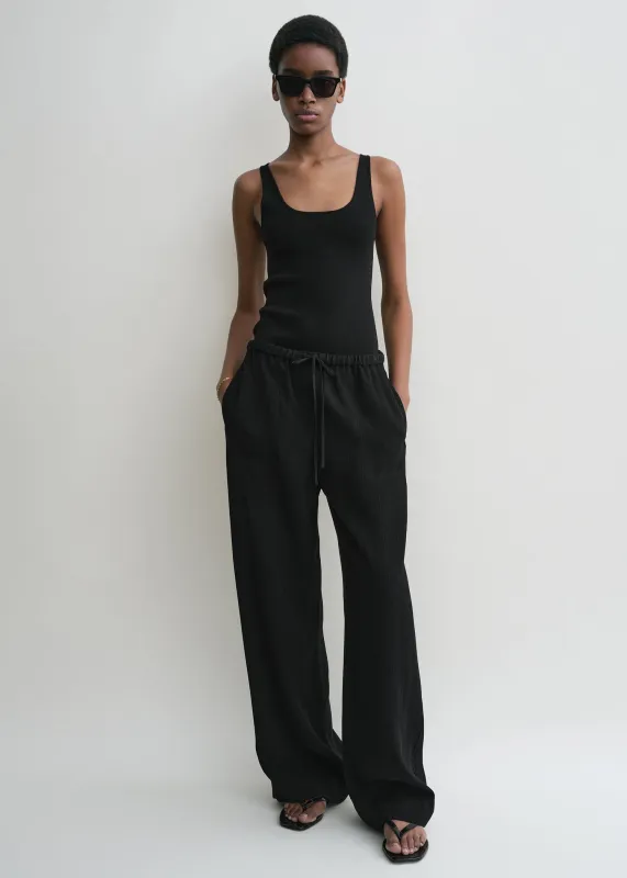 Woven stripe drawstring trousers black sold by Toteme