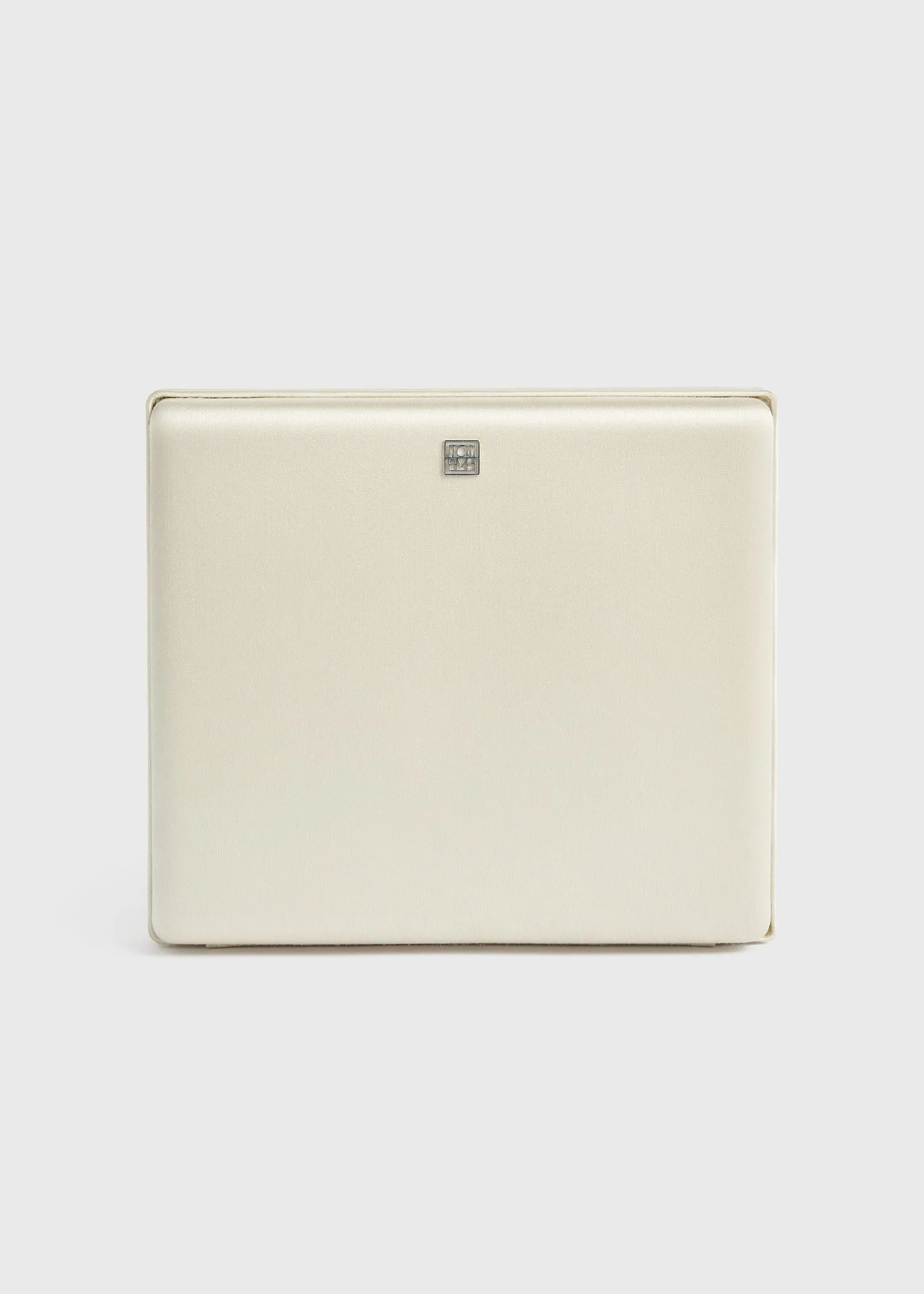 Satin box clutch ecru sold by Toteme