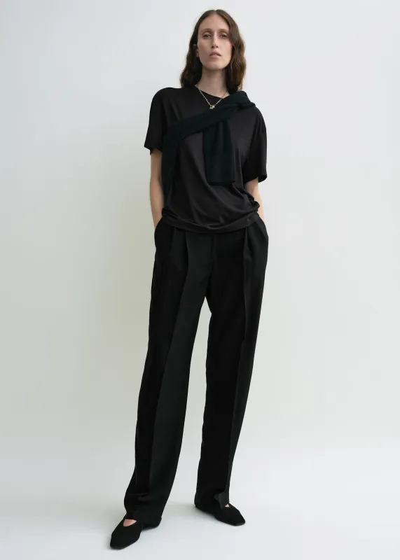 Double-pleat fluid trousers black sold by Toteme