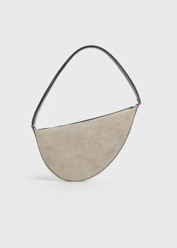 Suede scooped sling desert sold by Toteme