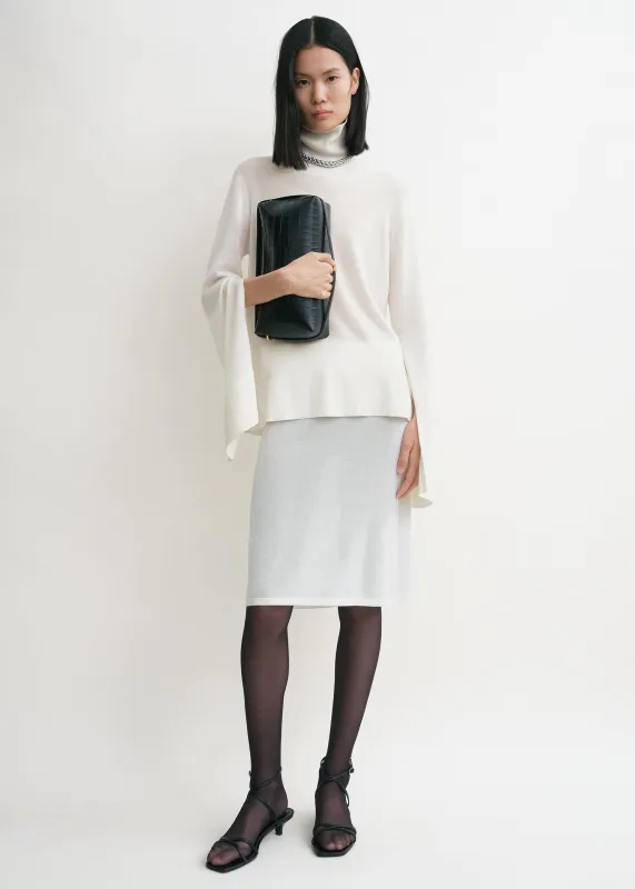Slit sleeve turtleneck white sold by Toteme