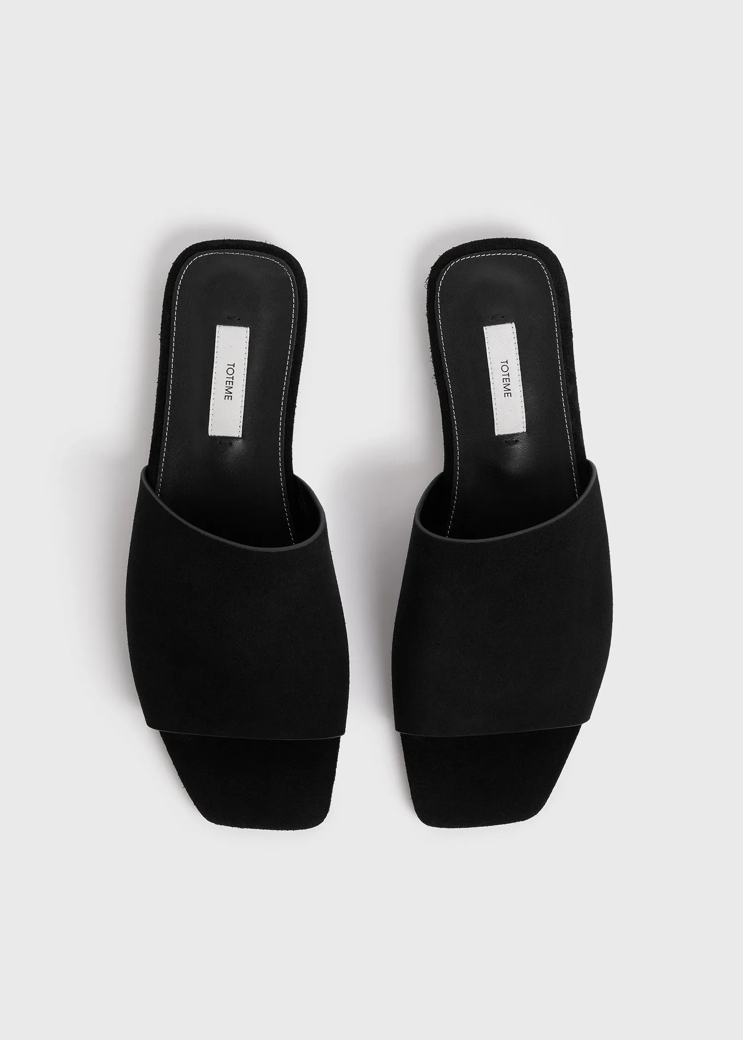 Velour-leather bandeau slides black sold by Toteme product image thumbnail 4