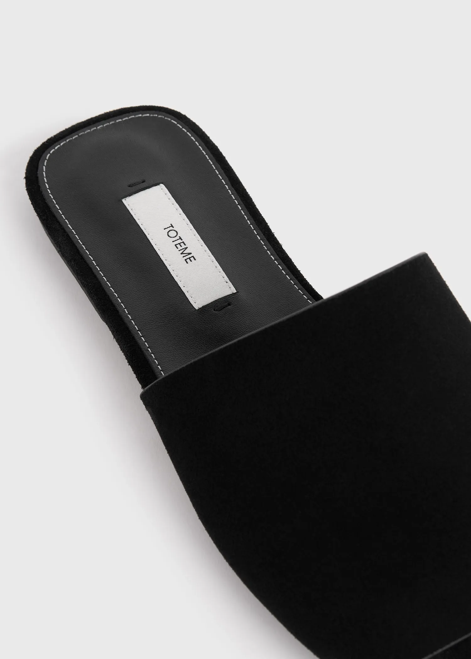Velour-leather bandeau slides black sold by Toteme product image thumbnail 5