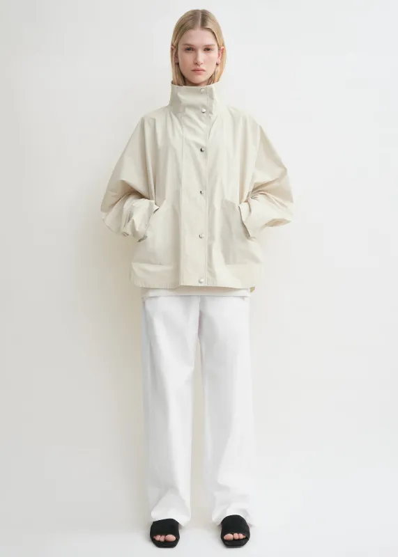 Summer parachute jacket oyster sold by Toteme