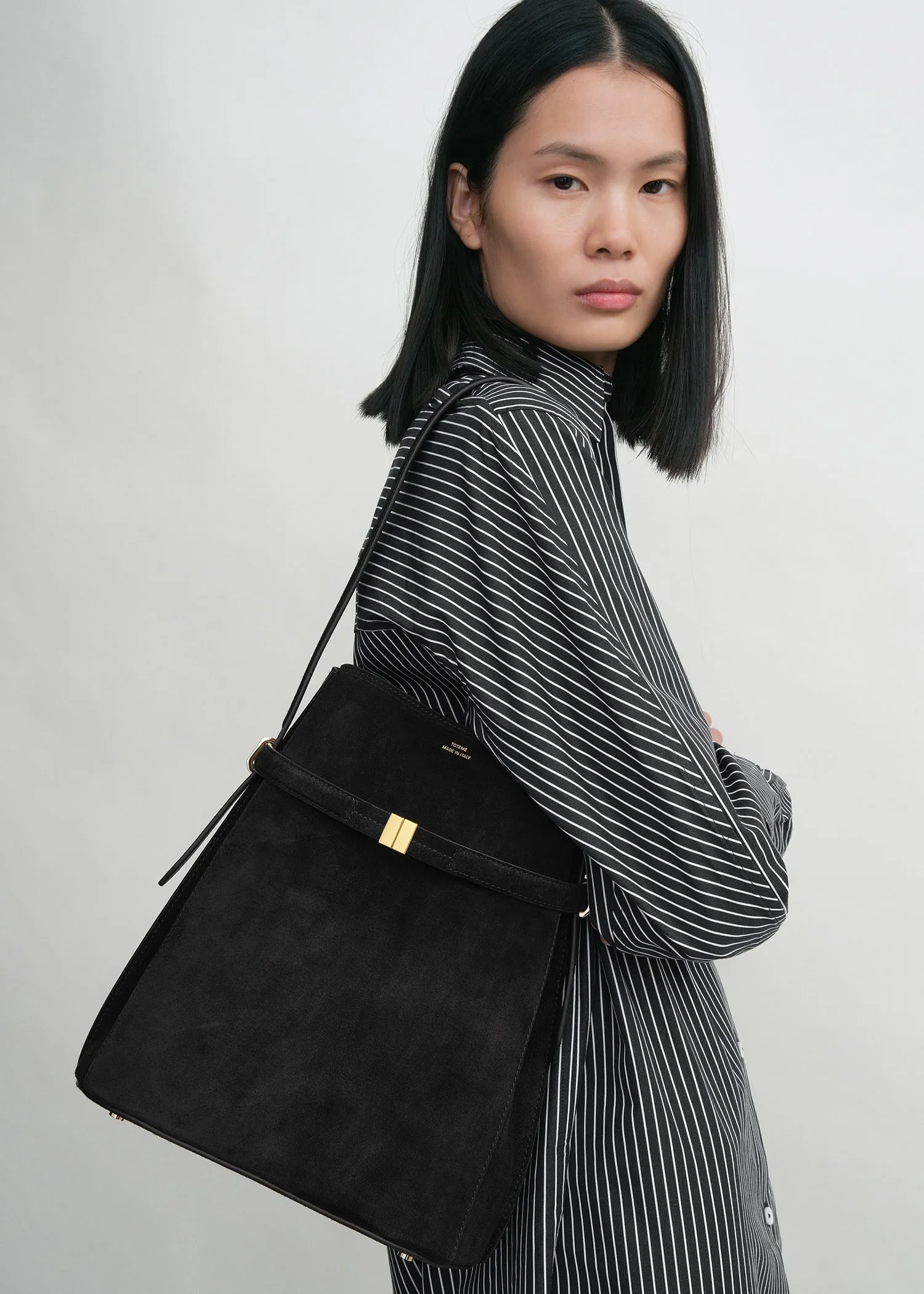 Belted suede bucket bag black sold by Toteme product image thumbnail 3
