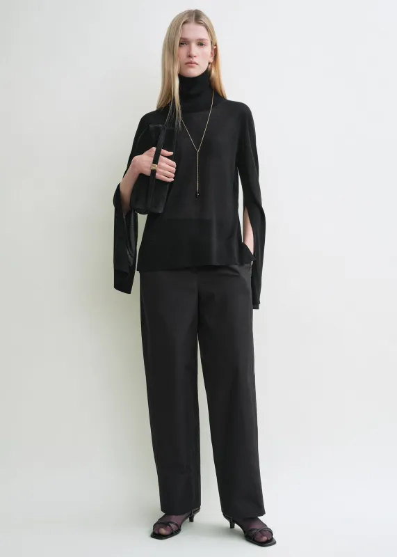 Slit sleeve turtleneck black made by Toteme