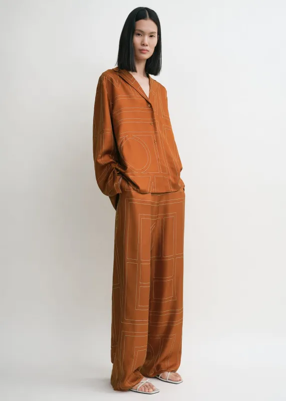 Monogram silk pj top terracotta sold by Toteme