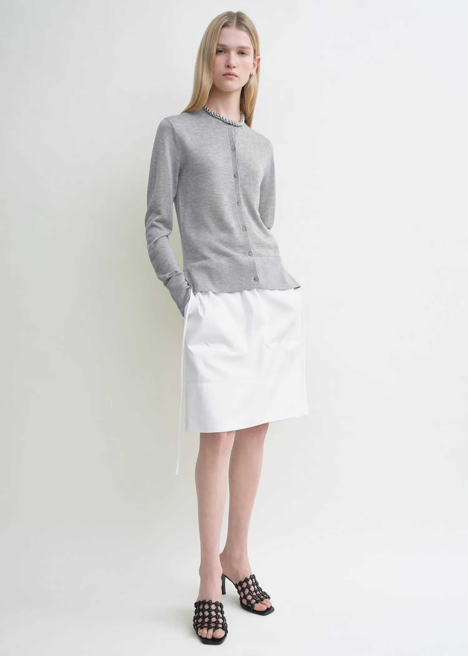 Fine knit cardigan grey sold by Toteme