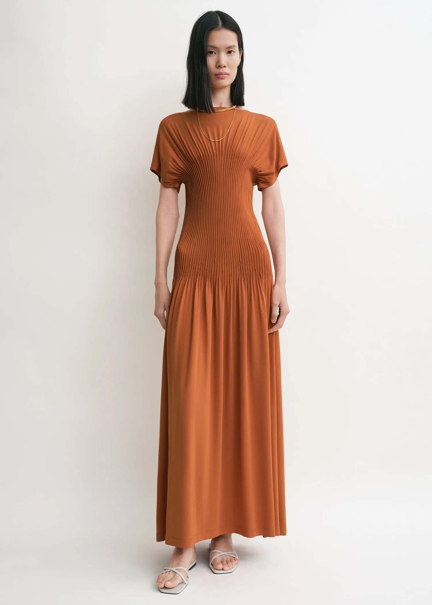 Knife-pleated jersey dress terracotta sold by Toteme