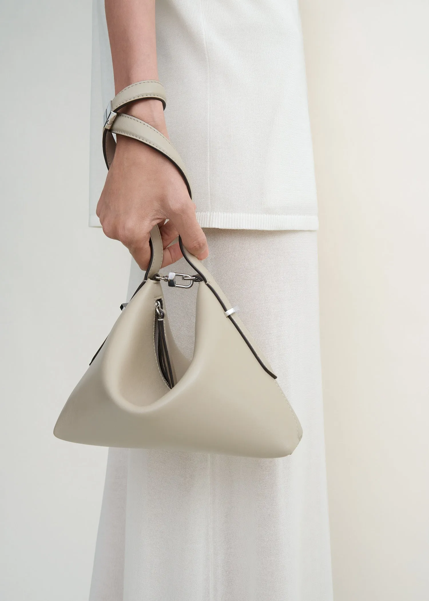 Bevel leather wristlet fawn sold by Toteme product image thumbnail 3