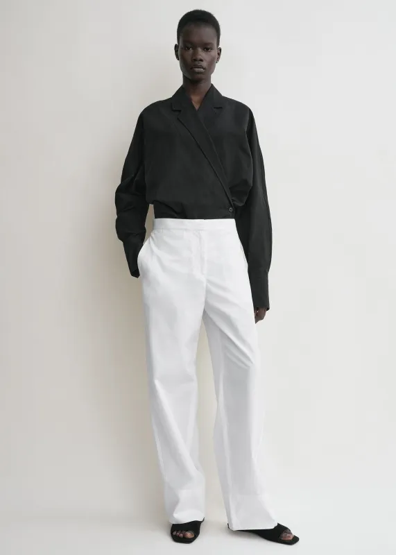 Wrap blouse black sold by Toteme