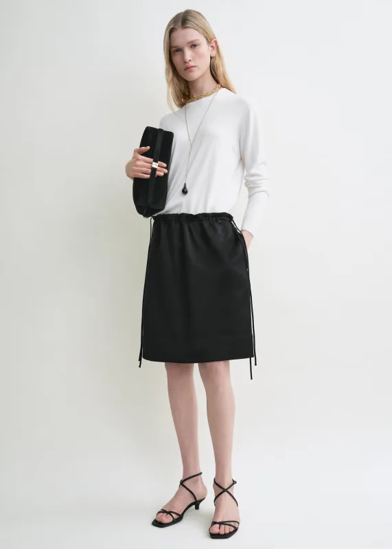 Drawstring satin mini skirt black sold by Toteme