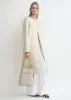 Belted suede bucket bag pearl sold by Toteme
