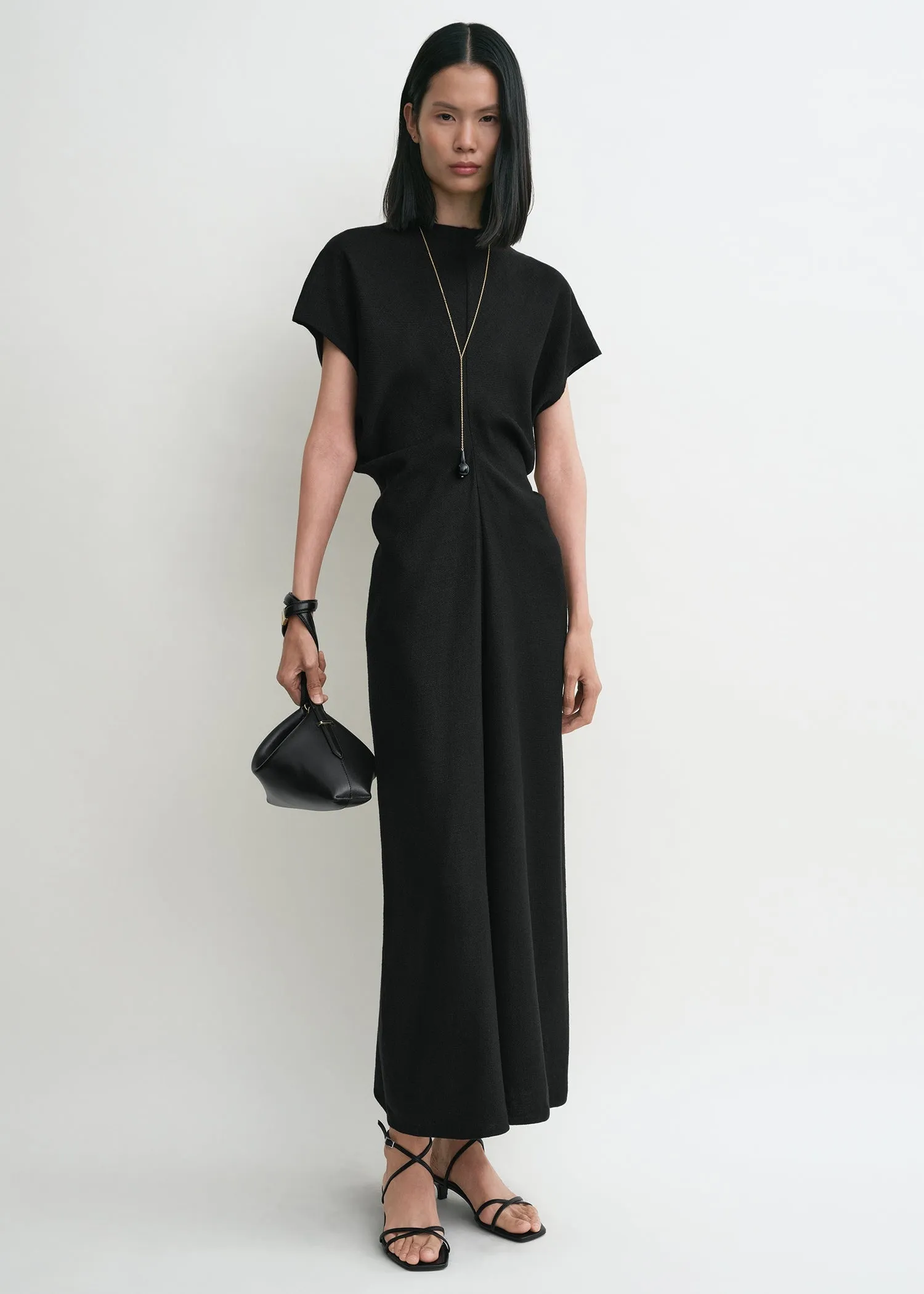 Slouch waist basketweave dress black sold by Toteme