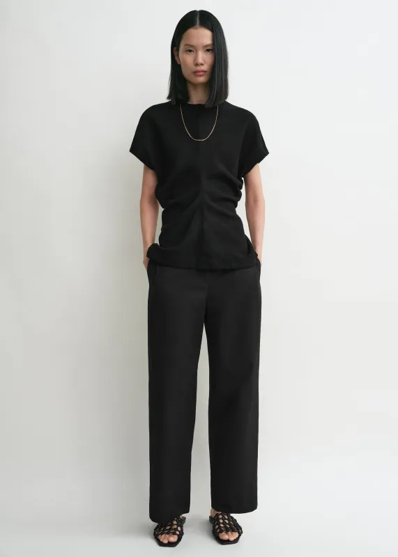 Slouch waist basketweave top black sold by Toteme