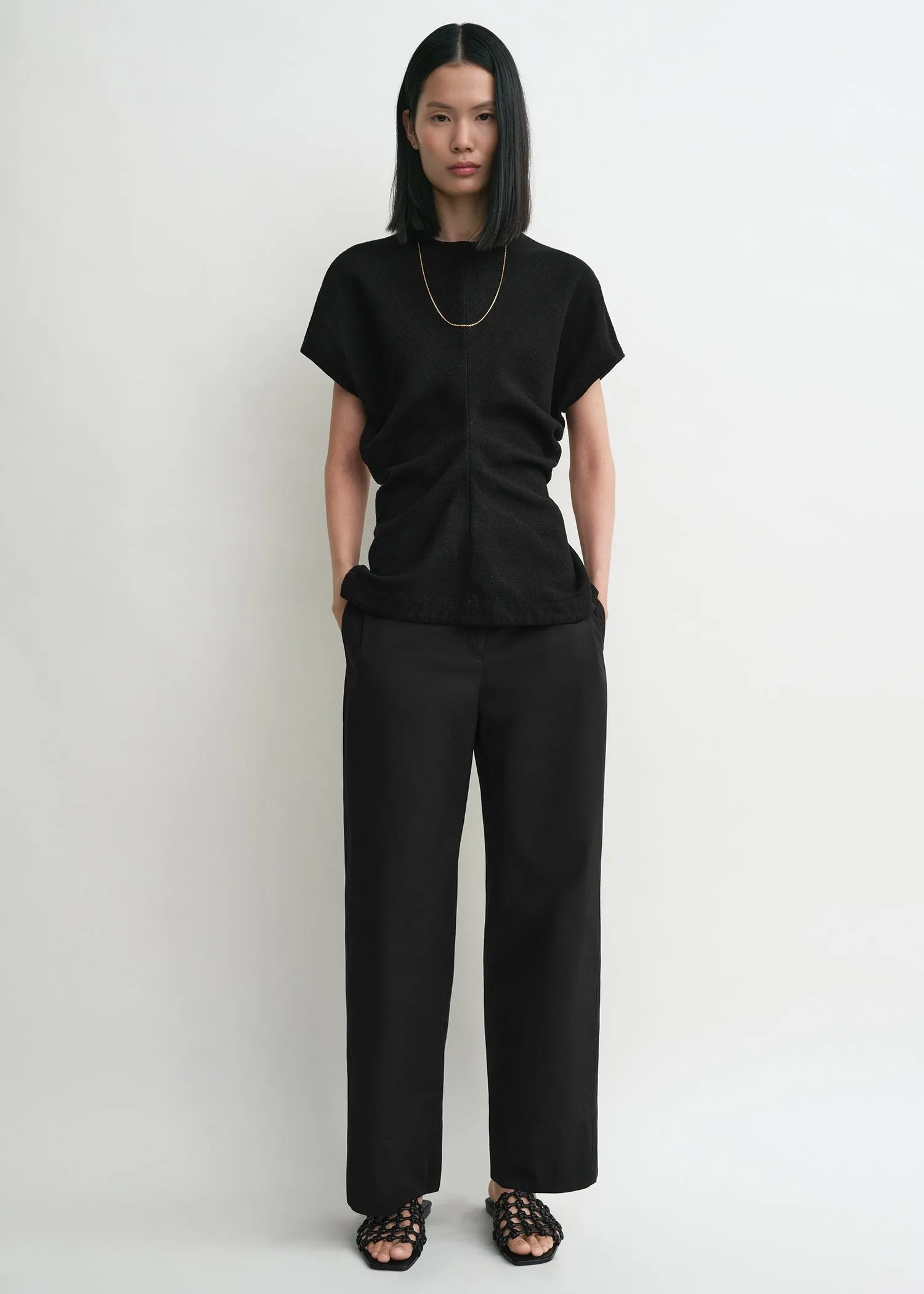 Slouch waist basketweave top black sold by Toteme